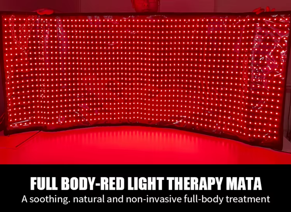Red light therapy mat with glowing red lights on a red background